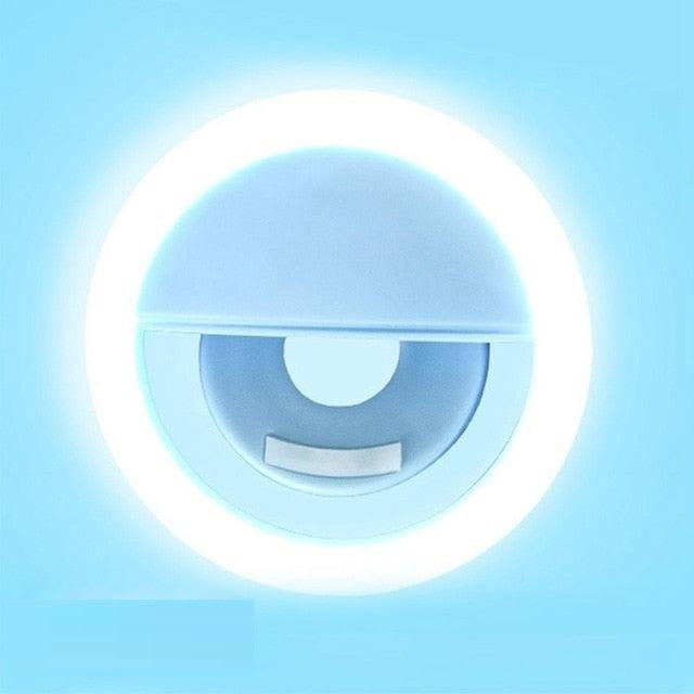 Small, portable LED ring light accessory for phones, ensuring bright, clear selfies & engaging video calls.