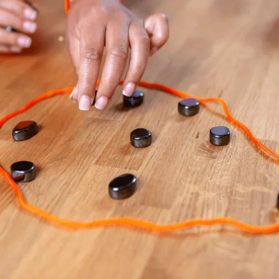 Unisex portable magnetic board game for travel. A fun strategy game for all ages.