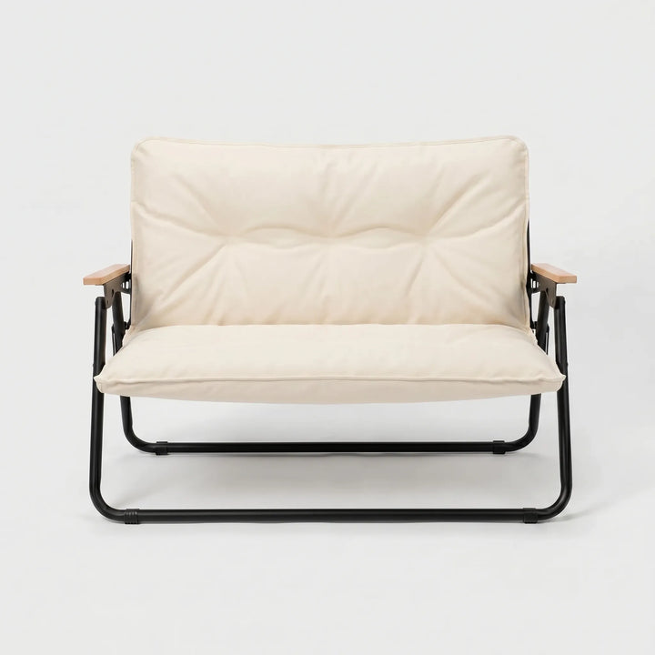 Lightweight two-person folding outdoor sofa, perfect for camping, patio, or travel comfort.