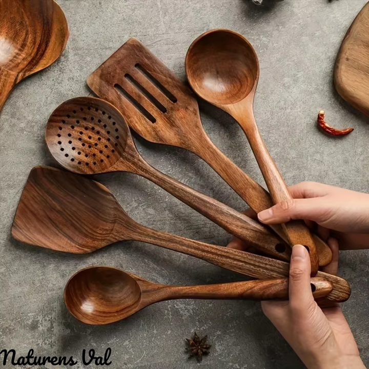 Natural teak wood kitchen utensil set. Eco-friendly cooking tools for a healthy, minimalist kitchen design.
