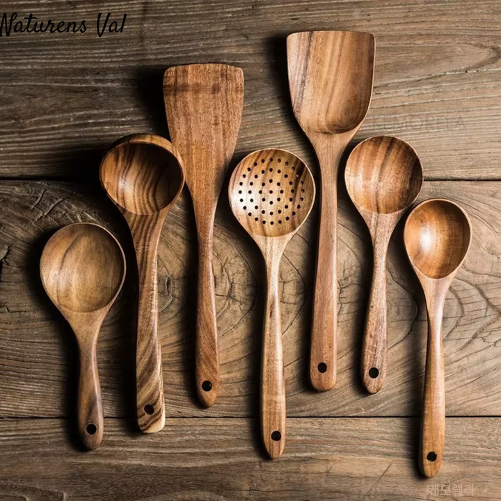 Assorted teak wood kitchen spoons & spatulas. Premium cooking tools, perfect for healthy, natural cooking.