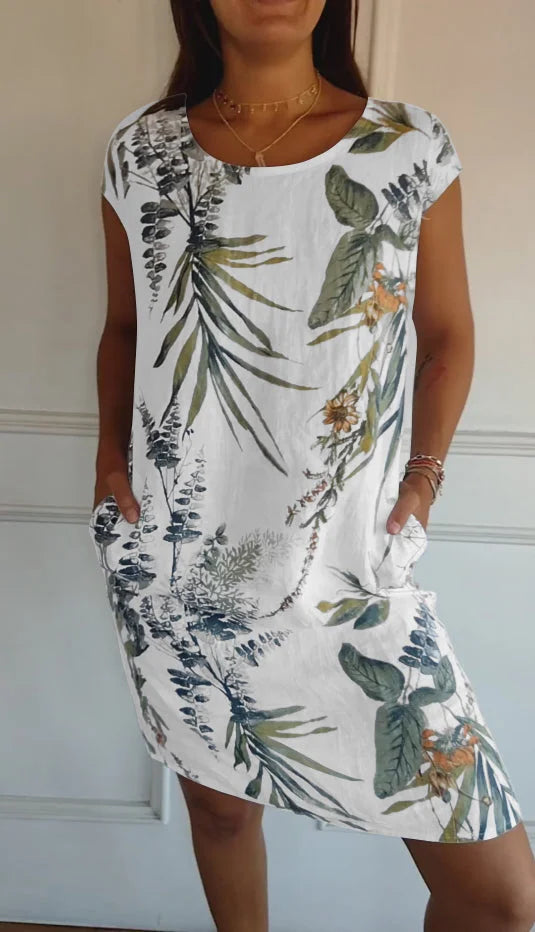 Women's effortless style printed round neck dress. Flowy knee-length summer dress, versatile for casual elegance.