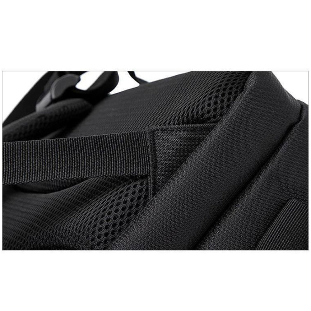 Waterproof camera backpack packed with DSLR camera, lenses, and photography equipment for secure transport.