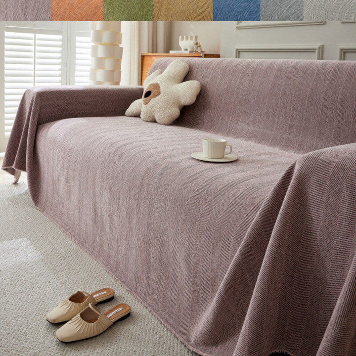 Pet-friendly geometric sectional sofa cover, a modern furniture protector for active living rooms and stylish homes.