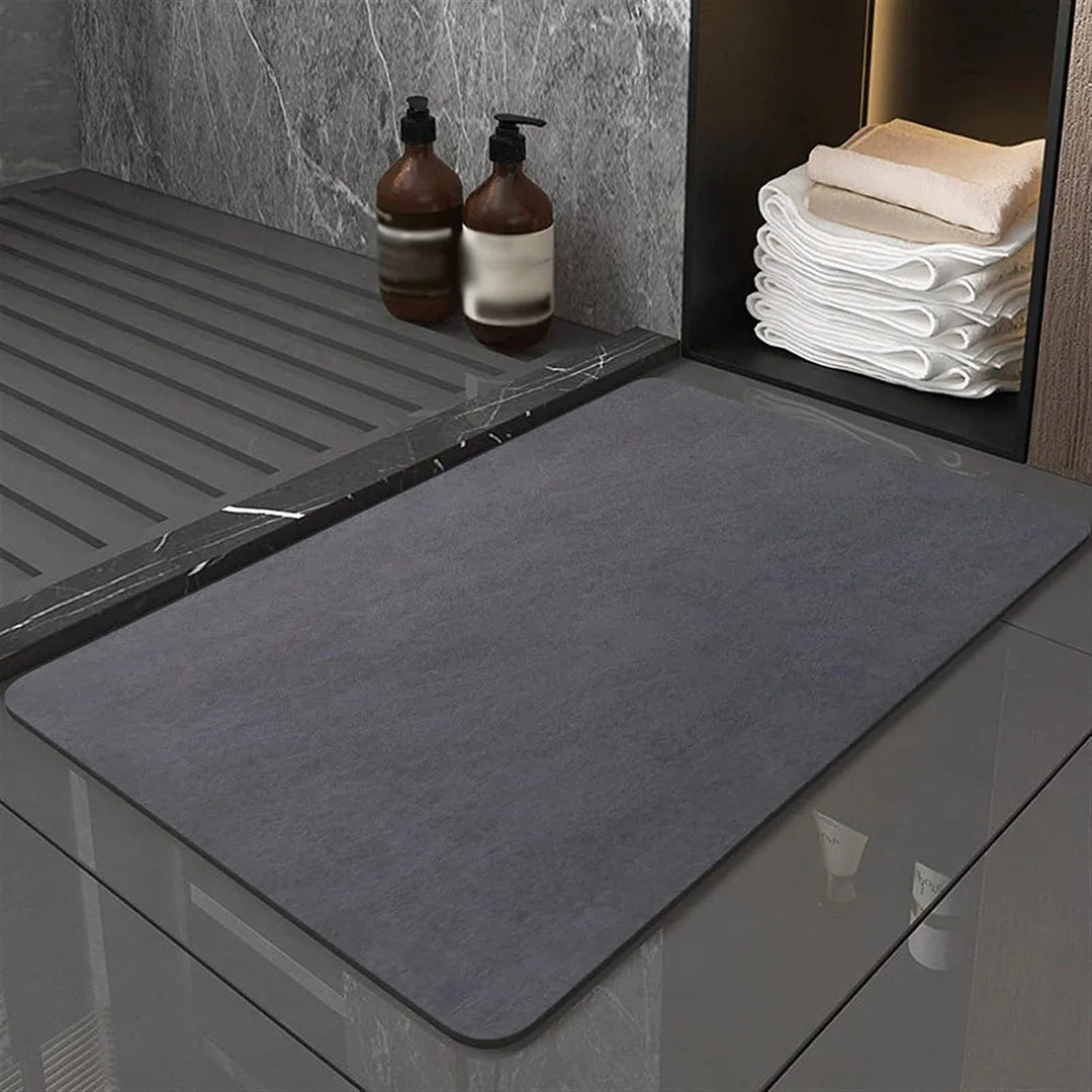 Modern quick-dry diatomite bath mat, ideal for keeping your bathroom floor dry & safe. Eco-friendly solution.