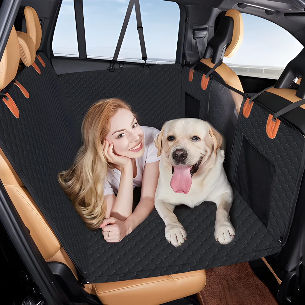 Quilted dog car seat extender creating a backseat bridge for pet travel safety & comfort.