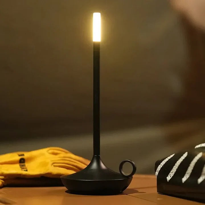 Rechargeable LED touch table lamp. Portable & wireless light, perfect for home decor, ambient or outdoor lighting.