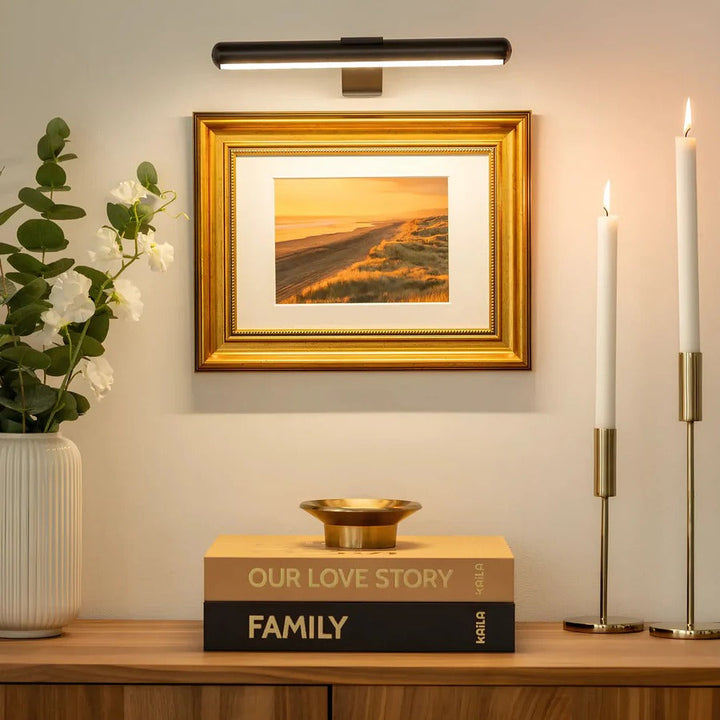 Rechargeable wireless LED wall light for artwork. Modern accent lighting for home decor and picture display.