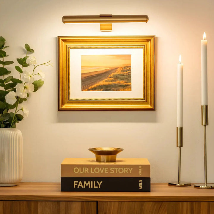 Easy-install wireless LED picture light. Rechargeable wall light illuminates artwork & decor with modern style.