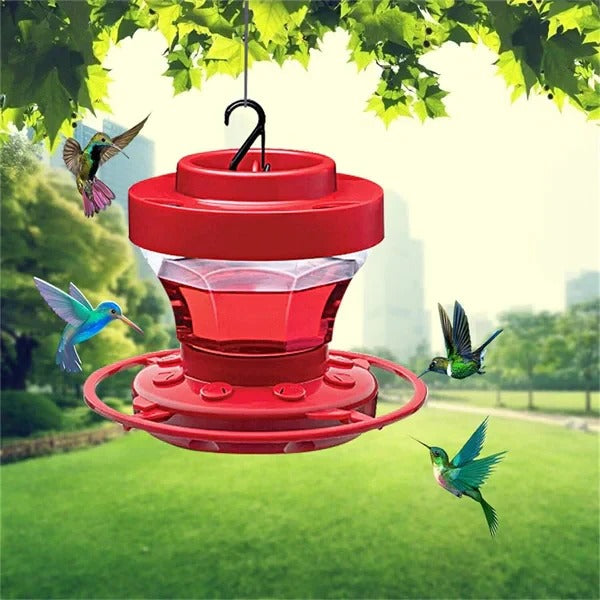 Red hummingbird feeder with ant & bee guard. Easy clean design for attracting beautiful hummingbirds to your garden.