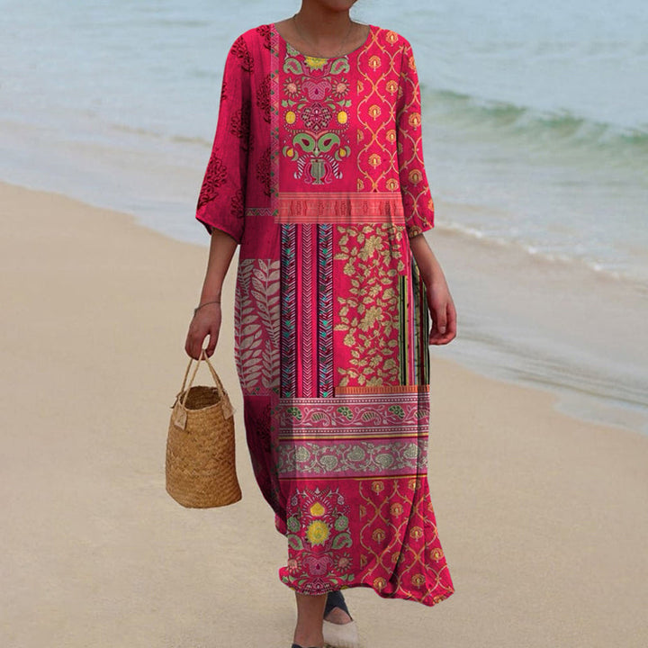 Red women's boho maxi dress with a loose, flowing fit. Ideal for comfortable summer, casual, or vacation wear, available in plus sizes.