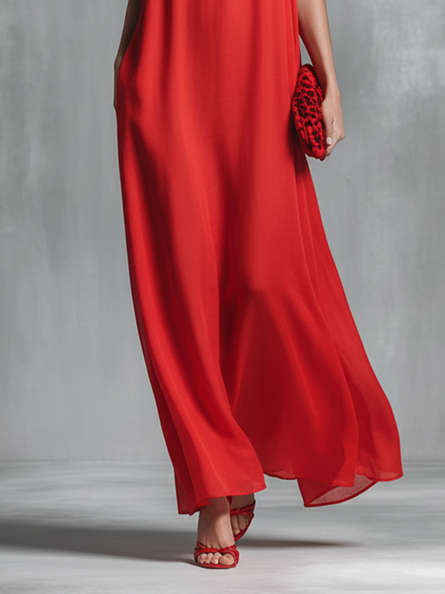 Stylish red women's maxi dress with V-neck, spaghetti straps, and a comfortable A-line design, great for various occasions.