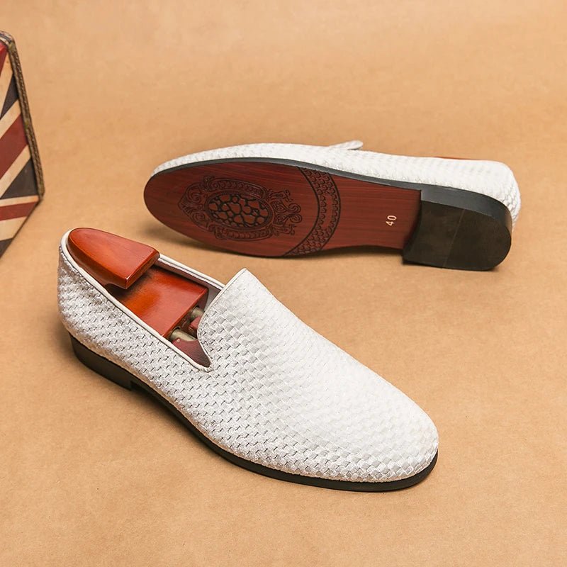 Men's dress loafers, slip-on style, suitable for both formal & casual wear. Elegant & comfortable footwear.
