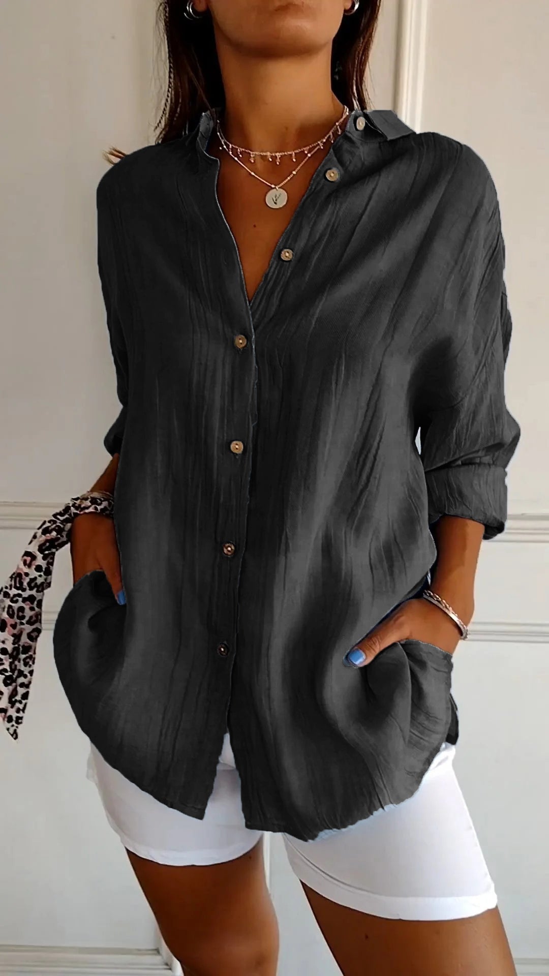 Soft relaxed fit women's long sleeve shirt, casual summer button-down for comfort.