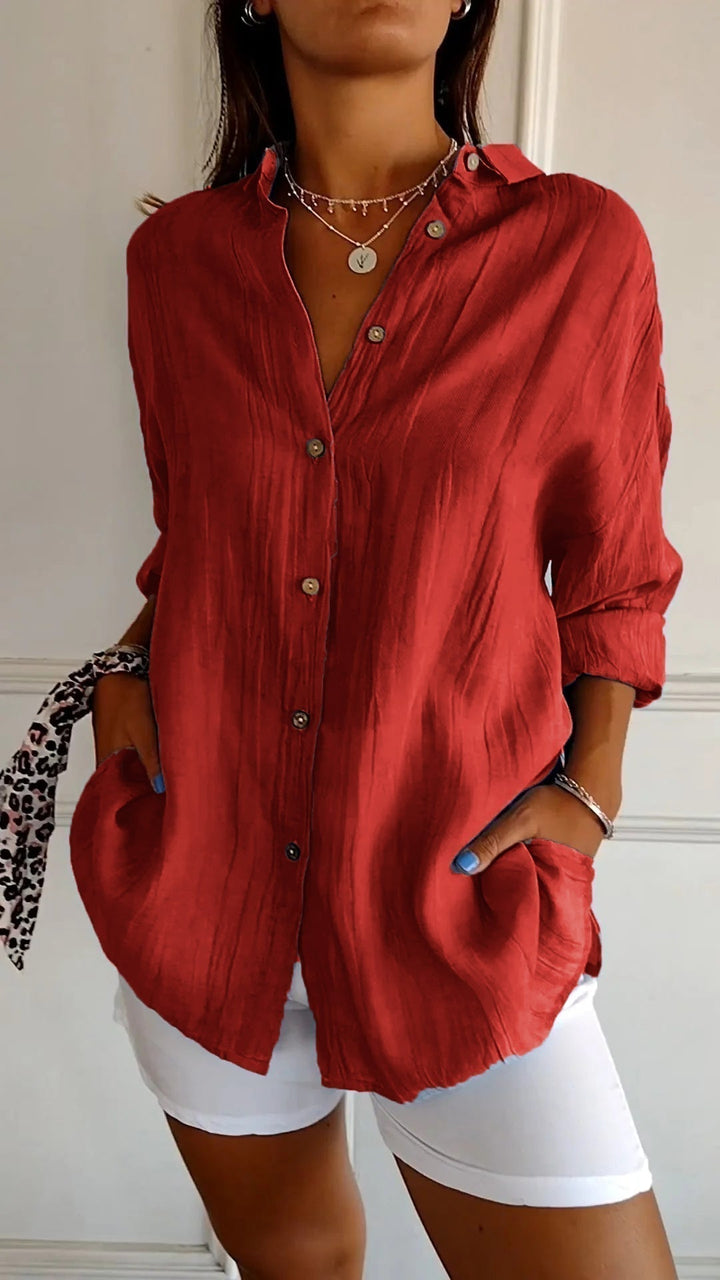 Light & airy women's long sleeve button-down, essential for chic summer fashion.