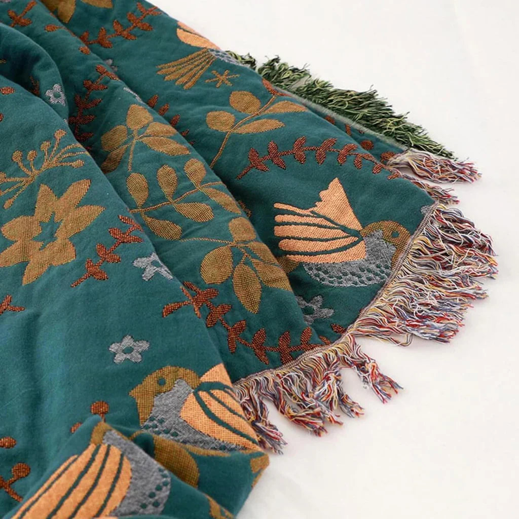 Stylish bird motif reversible blanket, a high-quality cotton throw perfect for scandinavian home decor.