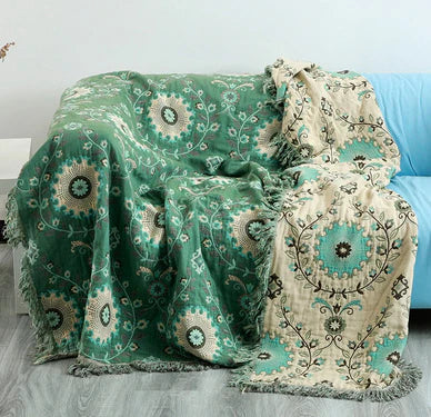 Elegant nordic bird design blanket, a versatile cotton throw adding cozy style to your home decor.