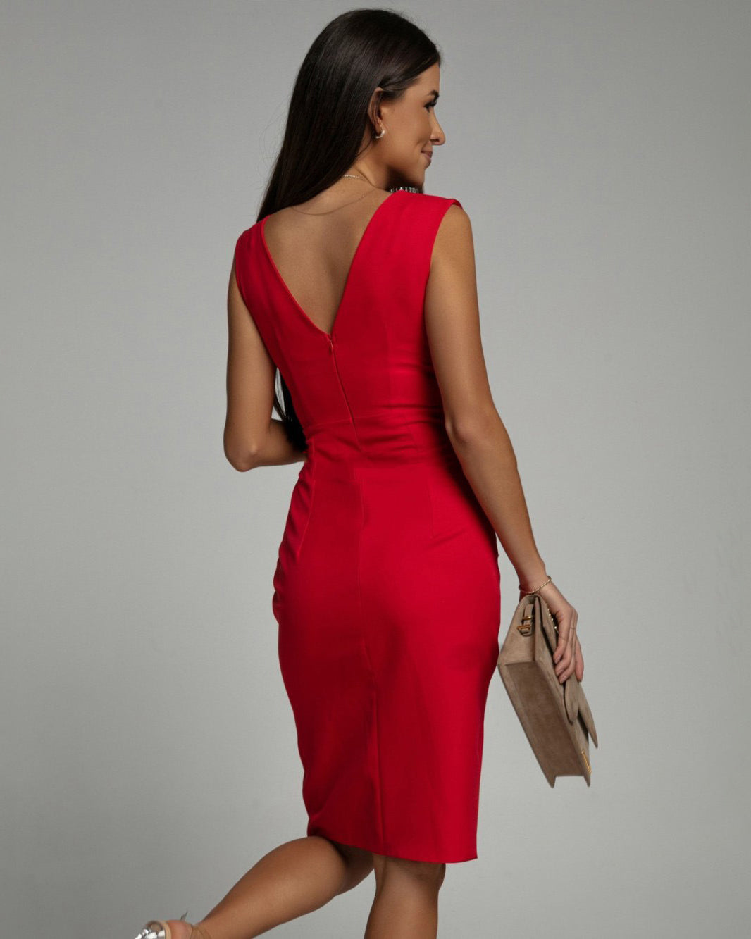 Chic black sleeveless V-neck bodycon midi dress, perfect for elegant evening events and date nights.