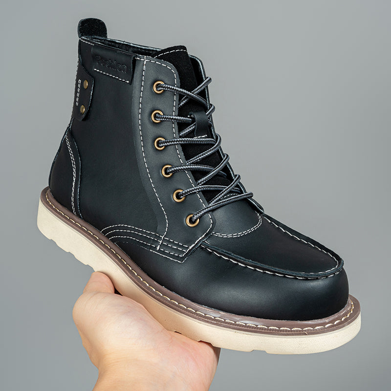 Close-up of the waterproof material on a black men's chukka boot, highlighting its durability