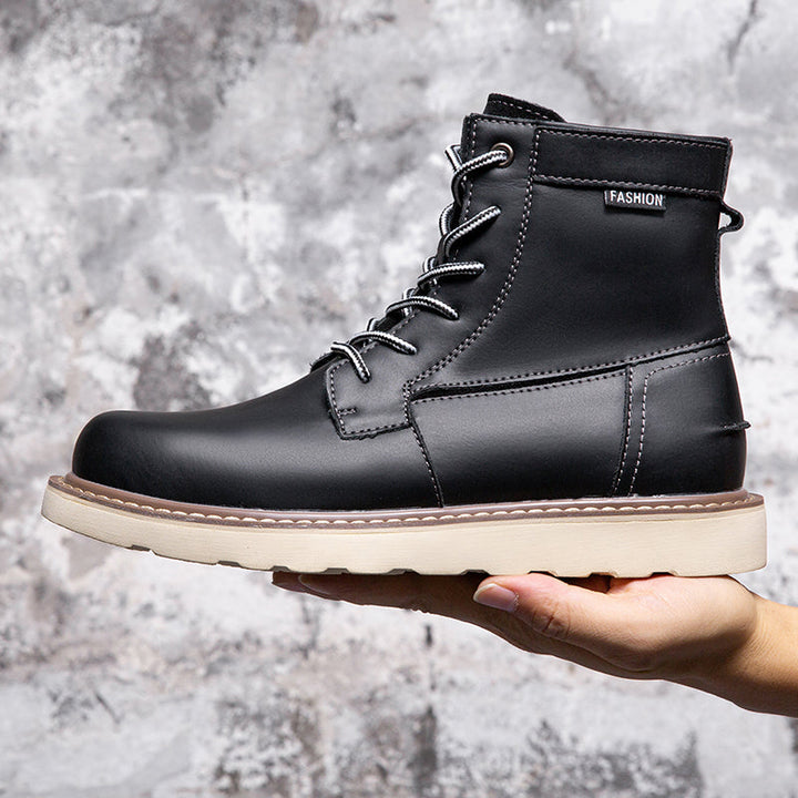 Black waterproof chukka boots for men, shown with their packaging to emphasize new product arrival