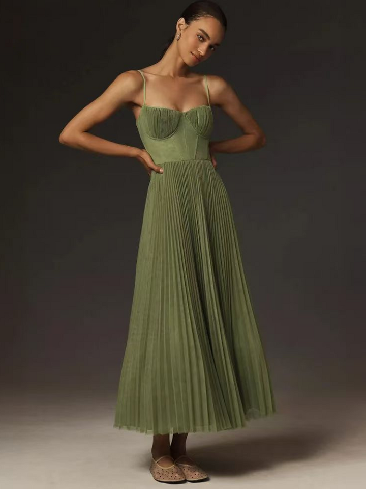 Beautiful sage green pleated maxi dress, a stylish corset gown for wedding guests.