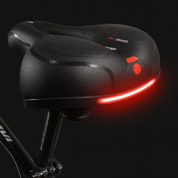 Unisex comfortable bicycle seat with integrated suspension for ergonomic cycling comfort. Universal fit bike saddle.