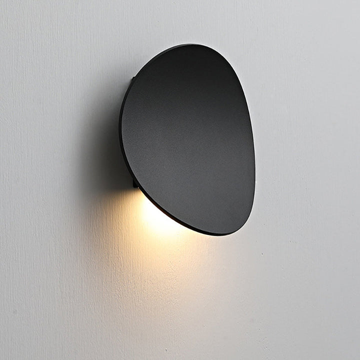 Contemporary LED wall sconce by Serevex, offering minimalist design & warm ambient light for walls.