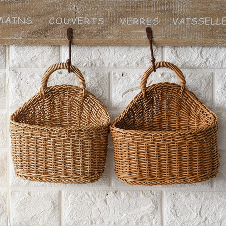 Natural handwoven wall storage baskets with handles. Ideal for kitchen, bathroom, or entryway organization.