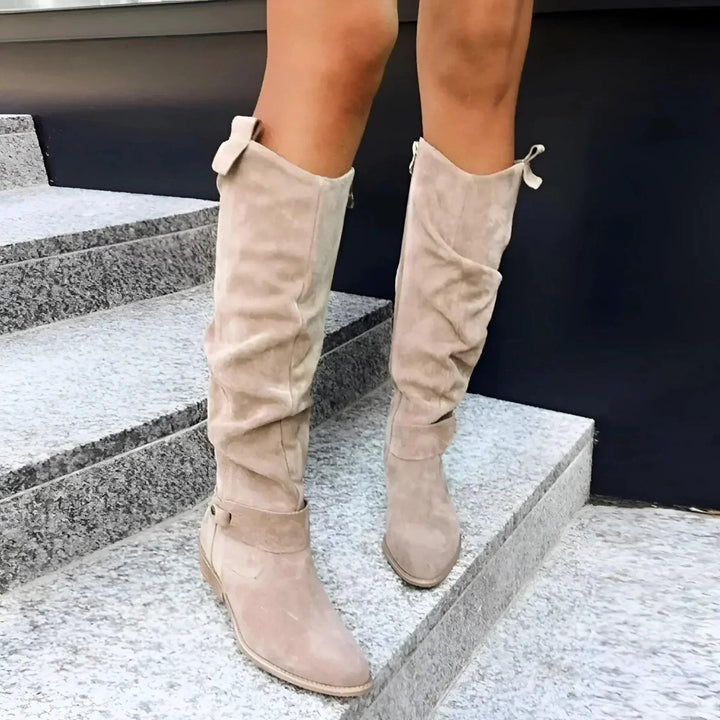 Stylish brown women's ankle boots with a sleek, structured fit, ideal for day to night wear.