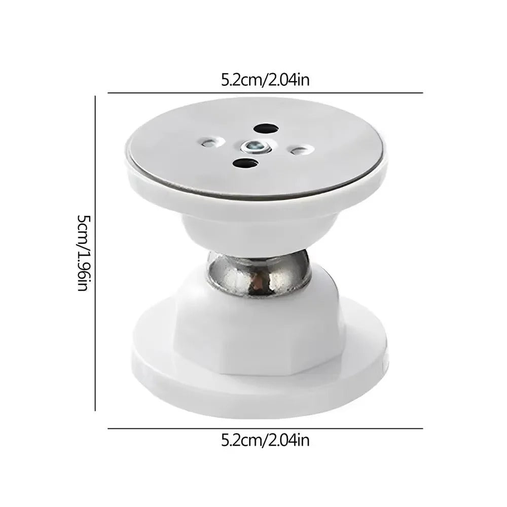 Magnetic door stop securing a door open, mounted on the floor. No-drill installation for home or office doors.