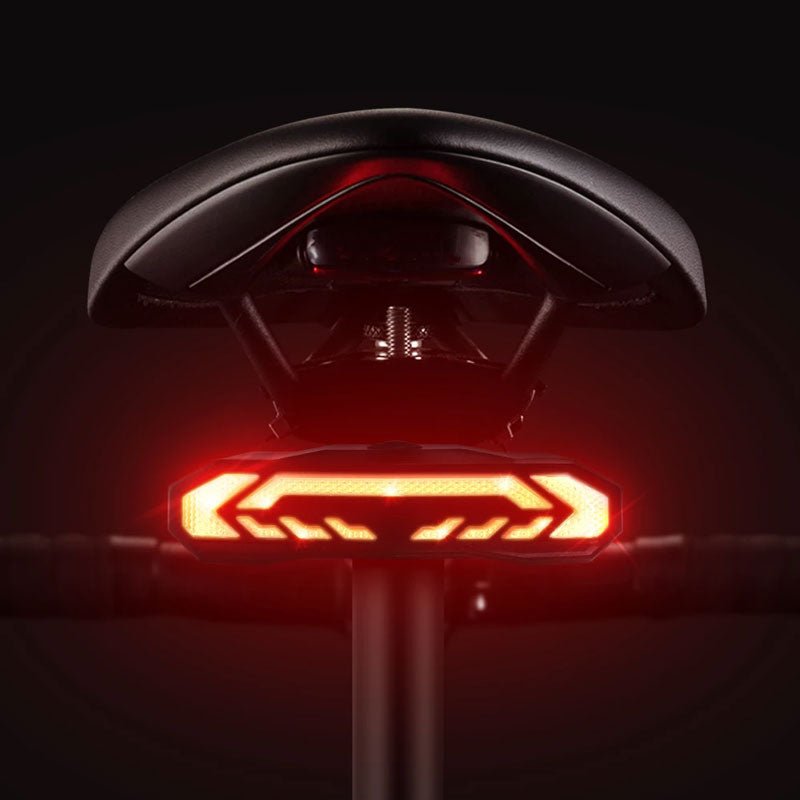 Smart bicycle rear light with anti-theft alarm. USB rechargeable & waterproof for cycling safety.