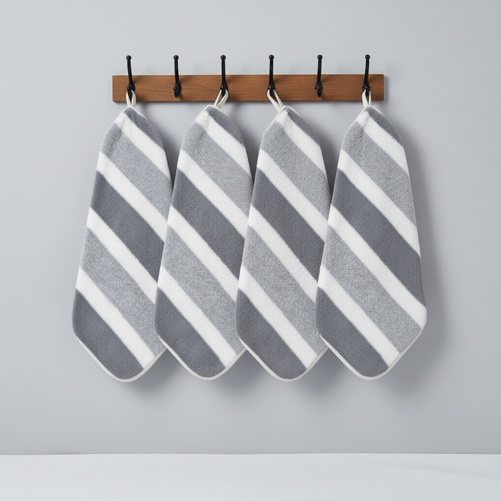 Premium soft coral fleece striped towel set. Highly absorbent polyester bathroom towels for stylish home decor.