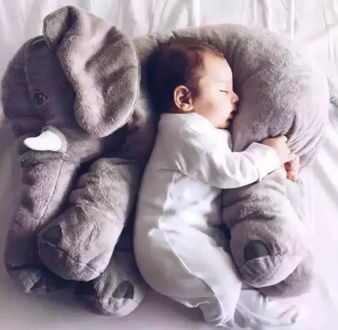 Soft baby elephant cuddle pillow, plush toy, perfect for cozy snuggles & comfort in nursery decor.