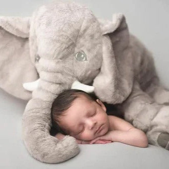 Charming baby elephant soft toy, a plush animal pillow for nursery decor, cuddles & comfort.