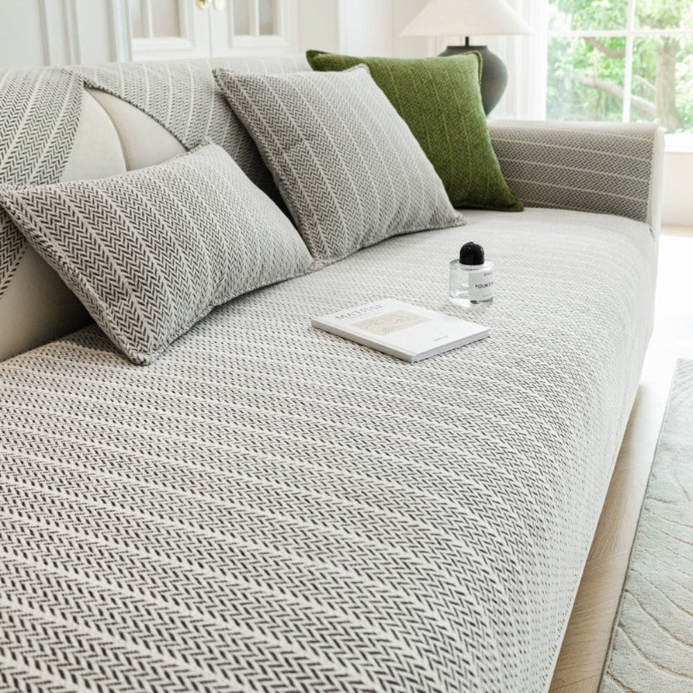 Pet-friendly chenille sofa cover with anti-scratch design. Washable furniture protector for your living room.
