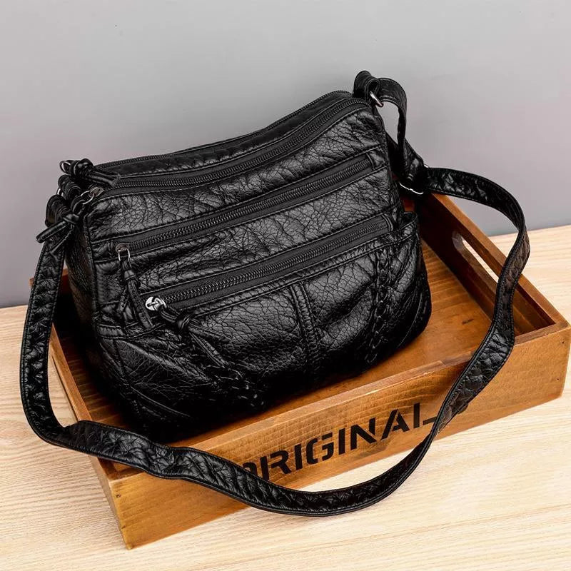 Brown soft leather women's shoulder bag, ideal for everyday use. Spacious, elegant handbag, a perfect fashion accessory.