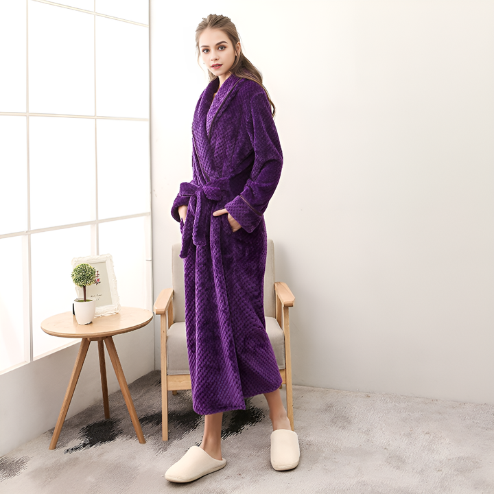 Luxurious women's plush robe with hood, offering soft comfort for sleepwear and relaxation.