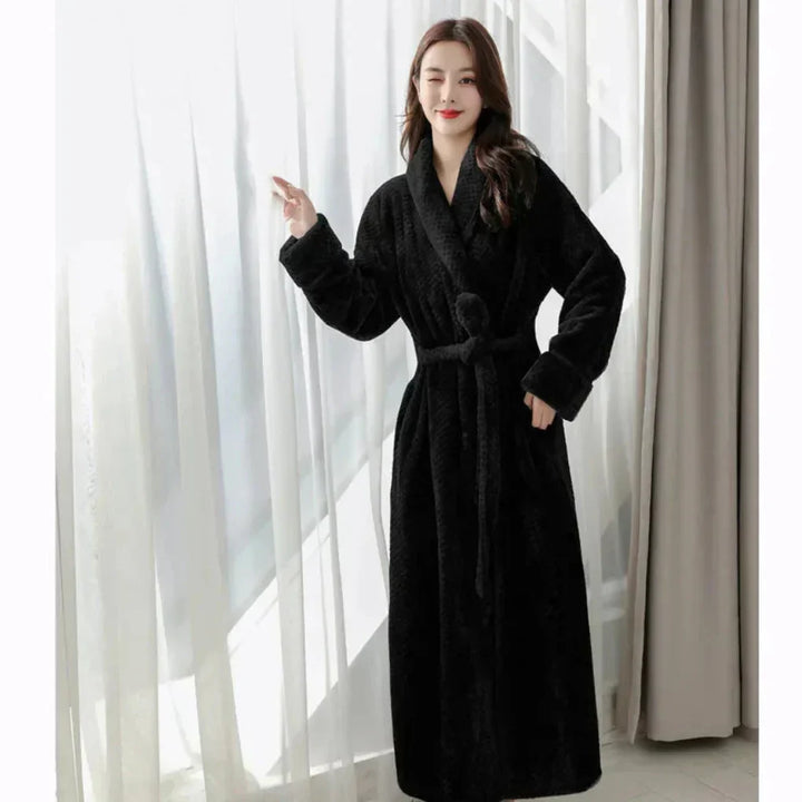 Women's hooded plush robe in a cozy design, perfect for soft sleepwear and comfortable relaxation.