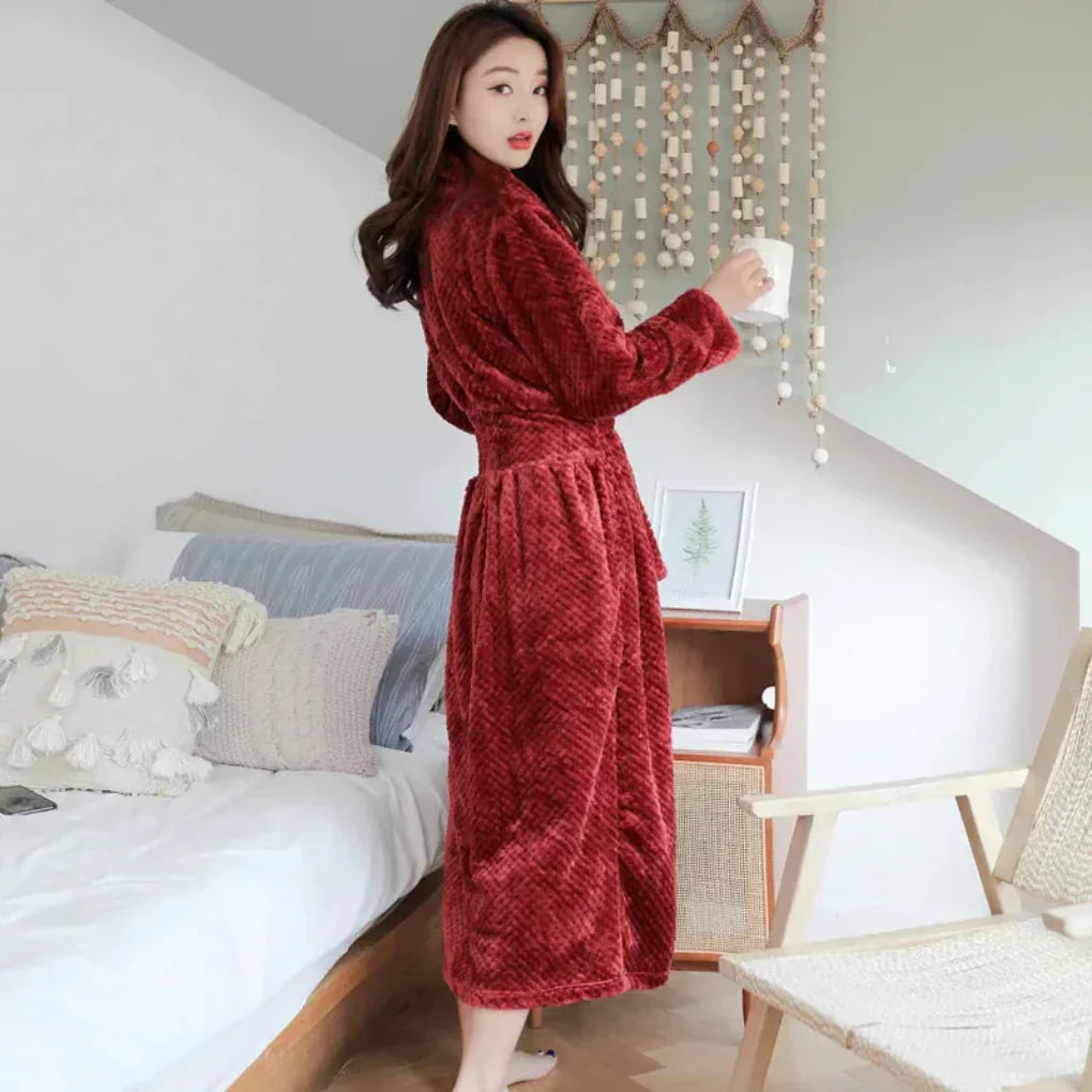 Ultra-soft women's plush hooded robe, offering cozy comfort as sleepwear or luxurious loungewear.