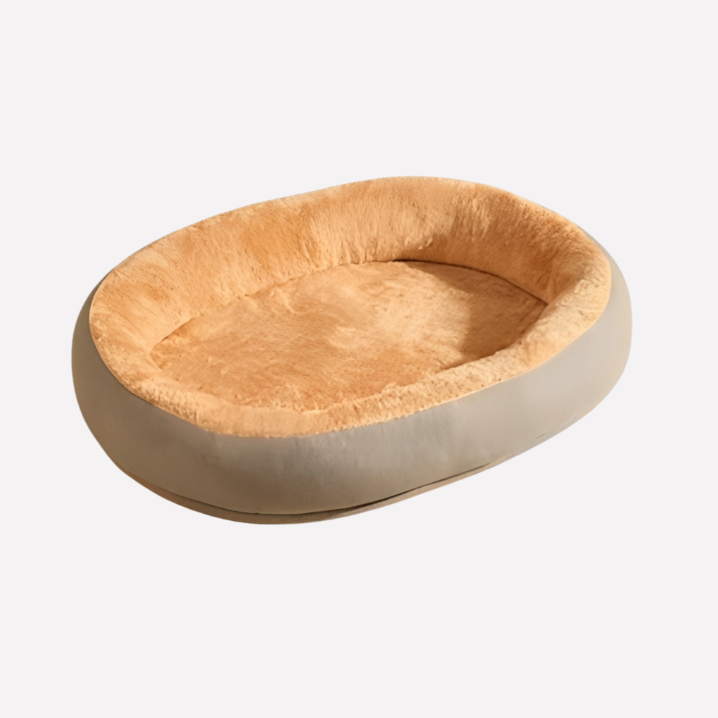 Cozy pet bed: a round, washable dog nest with a soft plush surface, perfect for any animal.