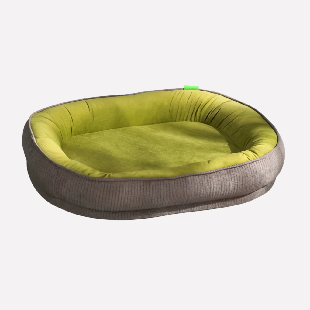 Ultimate comfort dog bed featuring a supportive nest design and a fully washable, soft plush cover.
