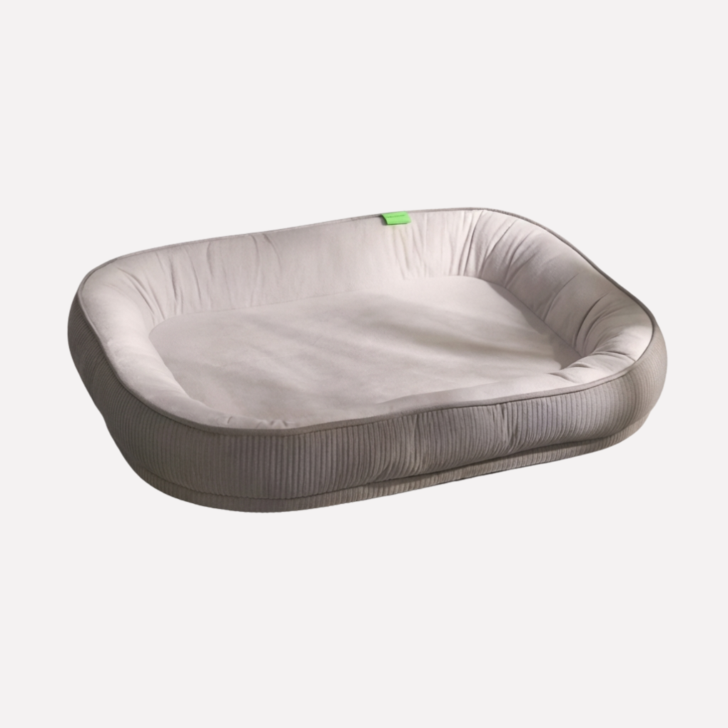 Luxury washable dog nest bed, a soft, cozy plush pet supply offering ultimate comfort for your animal.