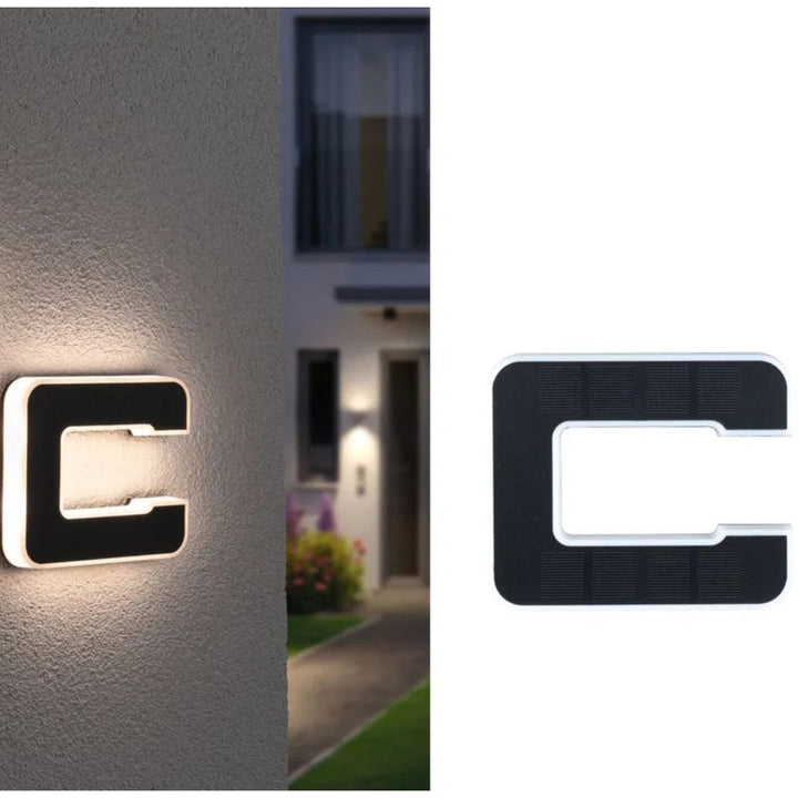 Weatherproof solar outdoor lighting house number, ensuring clear visibility day & night.