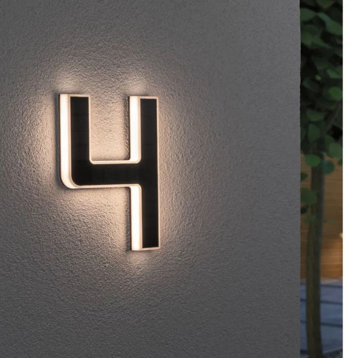 Weatherproof solar powered LED house numbers, durable outdoor lighting for all conditions.