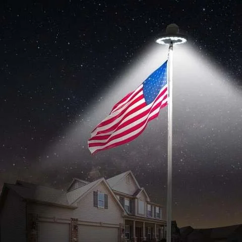 "Solar-powered LED flagpole light with 26 bright LEDs, illuminating flags at night; waterproof and easy to install."
