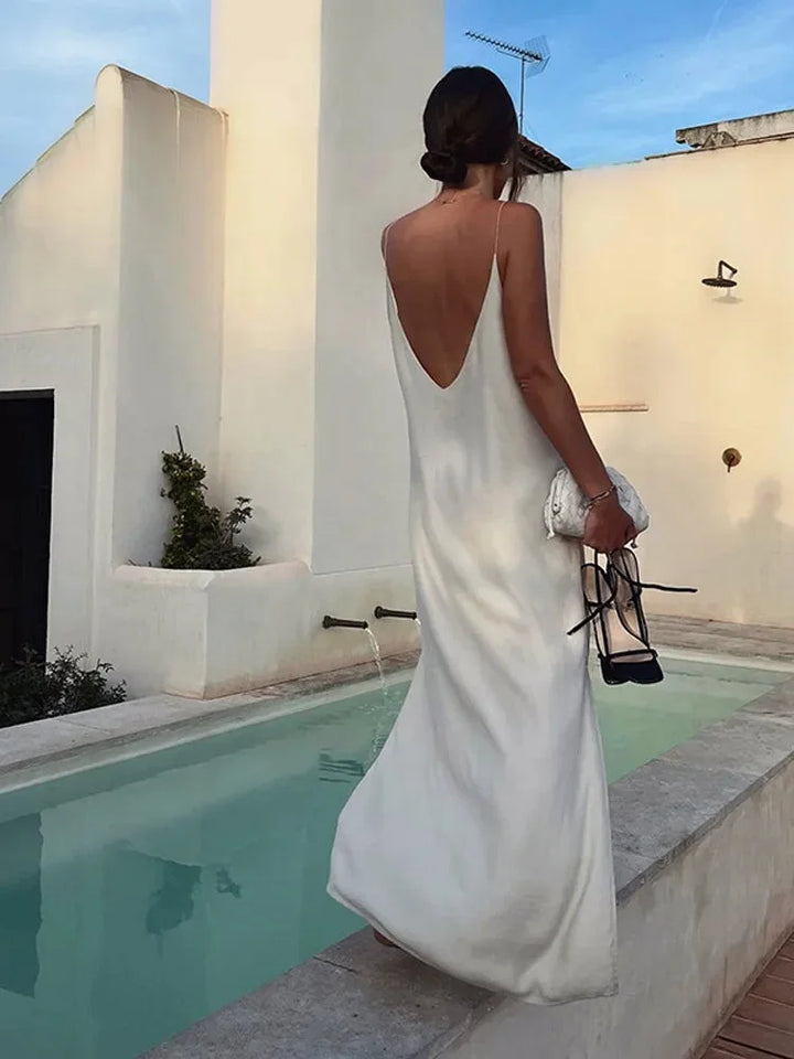 Solid white V-neck ankle-length maxi dress for women, relaxed fit, perfect for casual summer style.