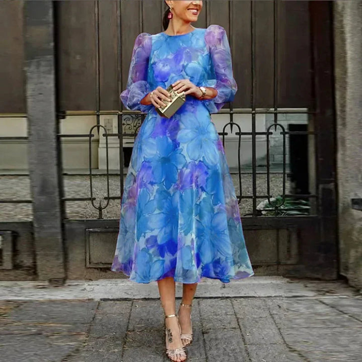 Elegant women's long sleeve floral midi dress, perfect for spring/summer special occasions & brunch.