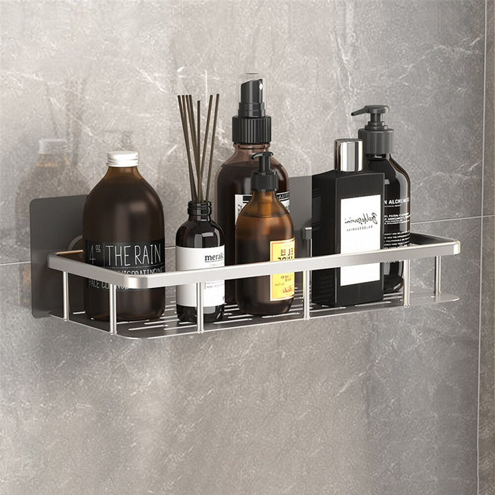 Modern black metal suction utility shelf for bath accessories & shower organization.