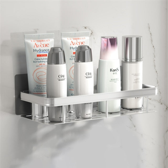 Space-saving metal suction shower caddy, ideal for shampoo, soap, & toiletries.