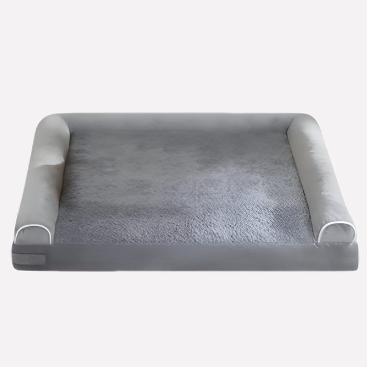 Large dog's plush orthopedic bed in light gray, designed for big dog comfort with an easy-clean, removable cover.